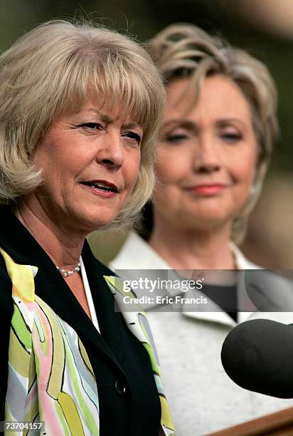 Senator Hillary Clinton looks on as Christie Vilsack announces her and her husband, former Iowa Governor Tom Vilsack's support of Clinton's...