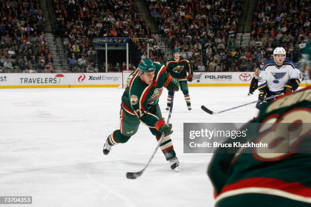 Branko Radivojevic of the Minnesota Wild shoots the puck against the St. Louis Blues during the game at Xcel Energy Center on March 22, 2007 in Saint...
