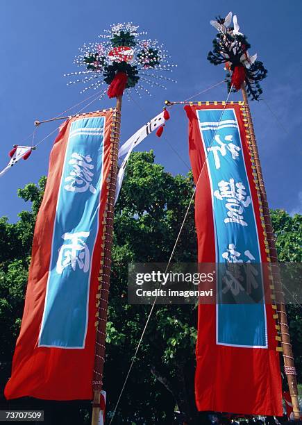 flags of festival - vertical flag stock pictures, royalty-free photos & images