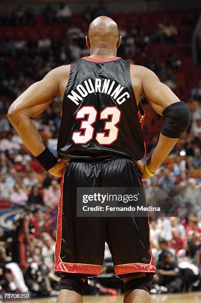 Alonzo Mourning of the Miami Heat stands on the court during the NBA game against the Minnesota Timberwolves at American Airlines Arena on March 9,...