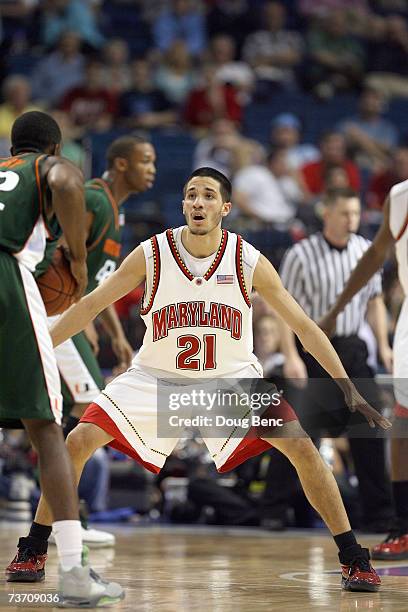 Greivis Vasquez of the Maryland Terrapins guards his player against the Miami Hurricanes in the opening round of the ACC Men's Basketball Tournament...