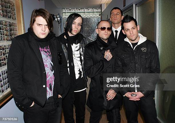 Paul Thomas, Billy Martin, Benji Madden, new drummer Dean Butterworth, and Joel Madden pose for a photo backstage during MTV's Total Request Live at...