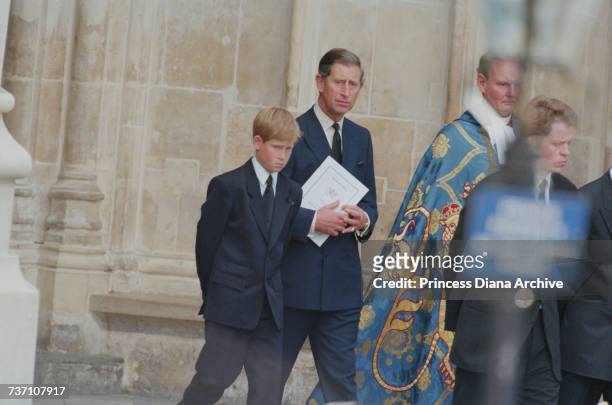 Prince Charles and Prince Harry at Westminster Abbey for the funeral service for Diana, Princess of Wales, 6th September 1997. On the right is...