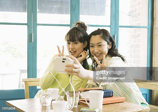 young women taking picture - only japanese stock pictures, royalty-free photos & images