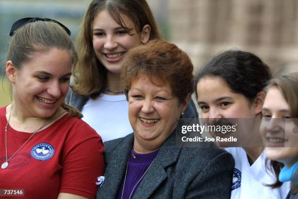 Norm McCorvey, the "Jane Roe" of Roe v. Wade, is surrounded by young people January 27, 2001 during an anti-abortion rally in Austin, Texas. The...