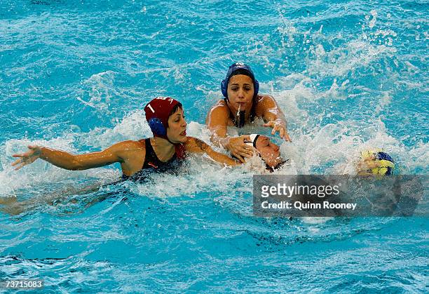 Anna Pardo Perarnau and Patricia Del Soto Traver of Spain grapple for the ball during the Women's Quarter Final Round Water Polo match between the...