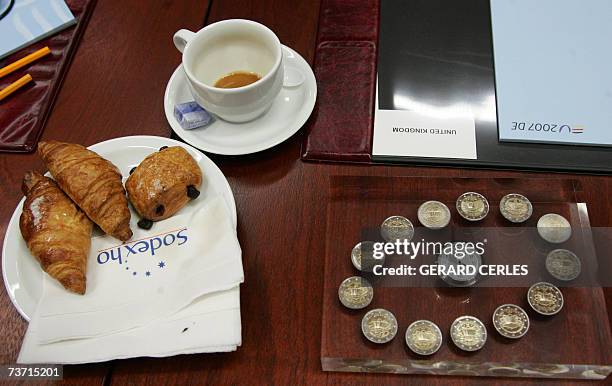 New euro coin collector issued to celebrate the 50th anniversary of the Treaty of Rome sits on a table 27 March 2007 before an Economy and Finance...