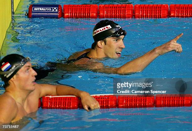 Michael Phelps of the United States of America celebrates winning the Men's 200m Freestyle final during the XII FINA World Championships at the Rod...