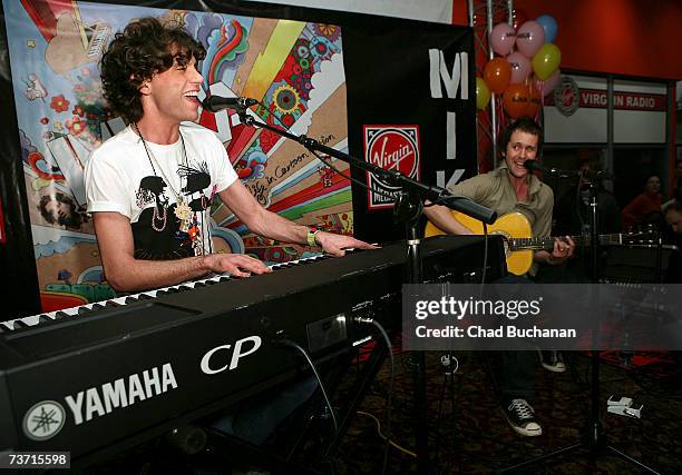 Musician Mika and guitarist Martin Waugh perform at Virgin Records store on March 26, 2007 in Los Angeles, California.