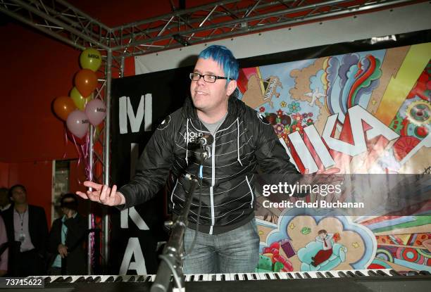 Perez Hilton introduces musician Mika before a performance at Virgin Records store on March 26, 2007 in Los Angeles, California.