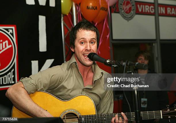 Guitarist Martin Waugh performs with Mika at Virgin Records store on March 26, 2007 in Los Angeles, California.