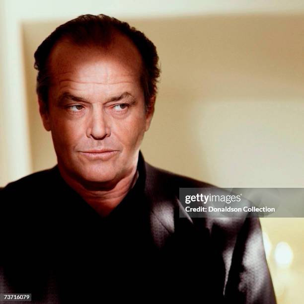 Actor Jack Nicholson poses for a photo shoot in 1993 in his hotel room, in Los Angeles, California.