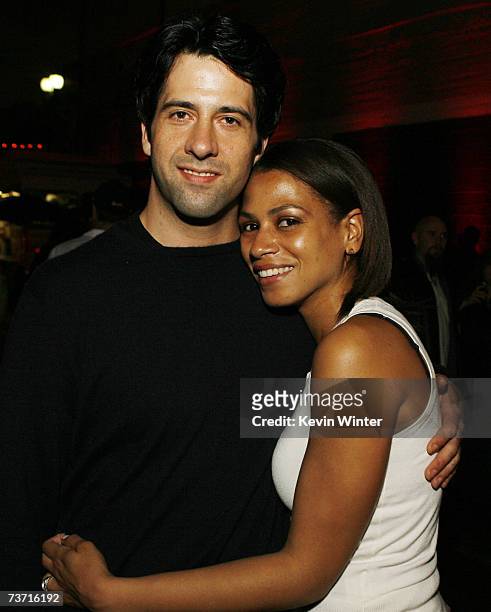 Actor Troy Garity and his fiance Simone Bent pose at the afterparty for the premiere at Dimension Films "Grindhouse" featuring Robert Rodriguez's...