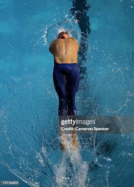 Aaron Peirsol of the United States of America competes in the Men's 100m Backstroke final during the XII FINA World Championships at the Rod Laver...