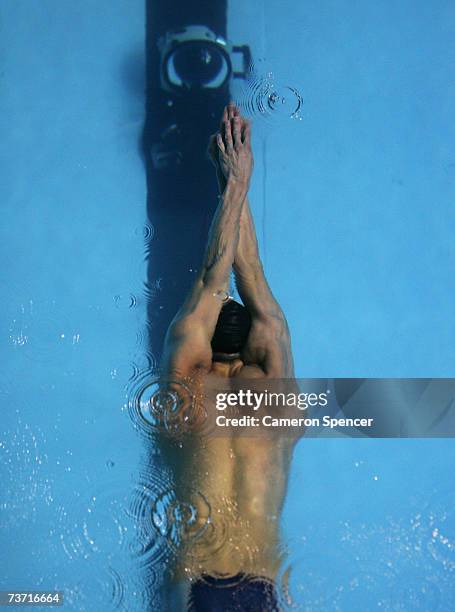 Michael Phelps of the United States of America competes in the Men's 200m Butterfly semi final during the XII FINA World Championships at the Rod...
