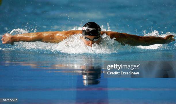 Michael Phelps of the United States of America competes in the Men's 200m Butterfly semi final during the XII FINA World Championships at the Rod...