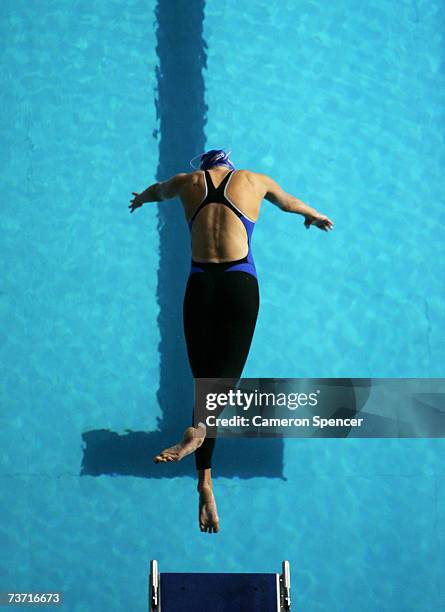 Caitlin McClatchley of Great Britain dives into the water in the Women's 200m Freestyle semi-final during the XII FINA World Championships at the Rod...