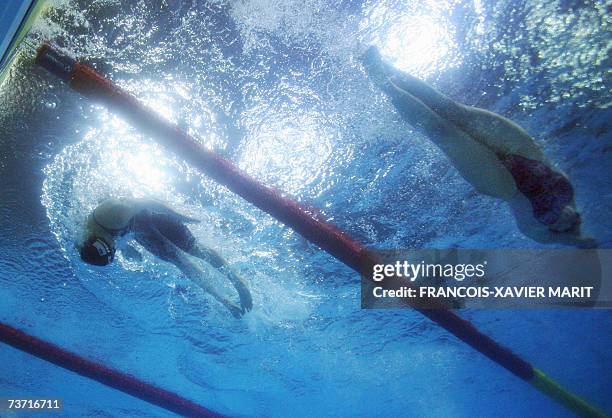 This underwater image shows Kate Ziegler of the US and Hayley Peirsol of the US swimming in the woman's 1500m freestyle finals, 27 March 2007 at the...