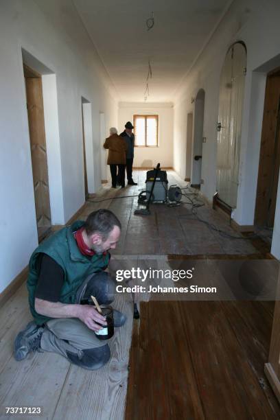 Tradesman works inside the house where Pope Benedict XVI was born on March 27, 2007 in Marktl, Germany. The Pope's birthplace is currently under...
