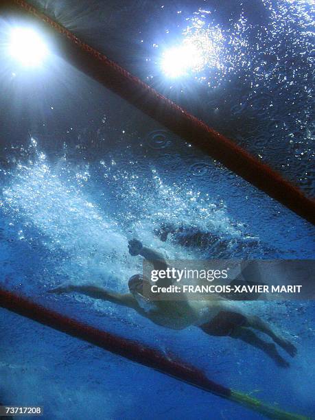 Underwater image showing US Michael Phelps during his 200 Butterfly Semifinal 27 March 2007 at the 12th FINA World Swimming Championships. AFP PHOTO...