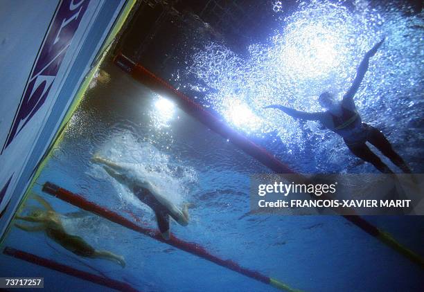 Underwater image showing Ukrainian Khistunova, US Tara Kirk and Australian Leisel Jones during their 100m breqststroke final 27 March 2007 at the...