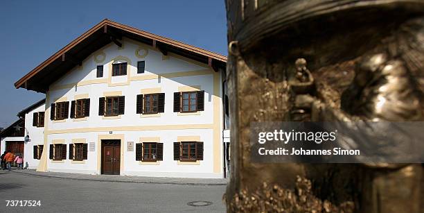 Column in honour of Pope Benedict XVI stands in front of the house where he was born on March 27, 2007 in Marktl, Germany. The Pope's birthplace is...