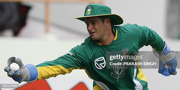 South Africa Wicket Keeper Mark Boucher catches the ball during a training session at Guyana National Stadium in Georgetown, 27 March 2007. Sri Lanka...