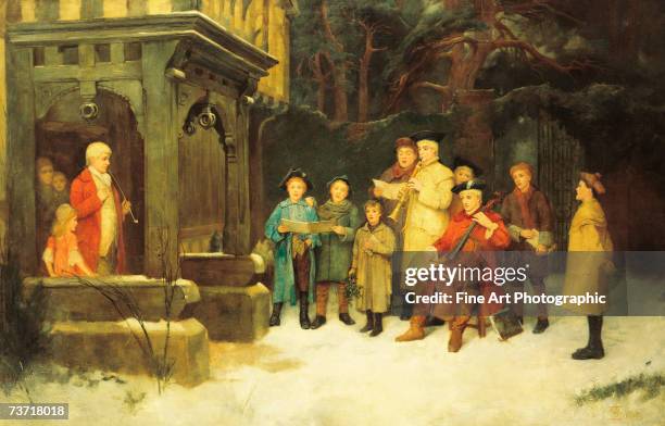 Group of carol singers on a wintry night at Christmas time. Artist dates: 1858