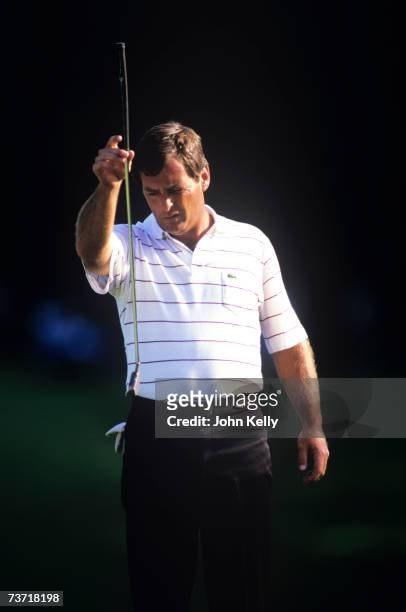 Fuzzy Zoeller lines up his putt on his way to his 1984 US Open Championship at the Winged Foot Golf Club.