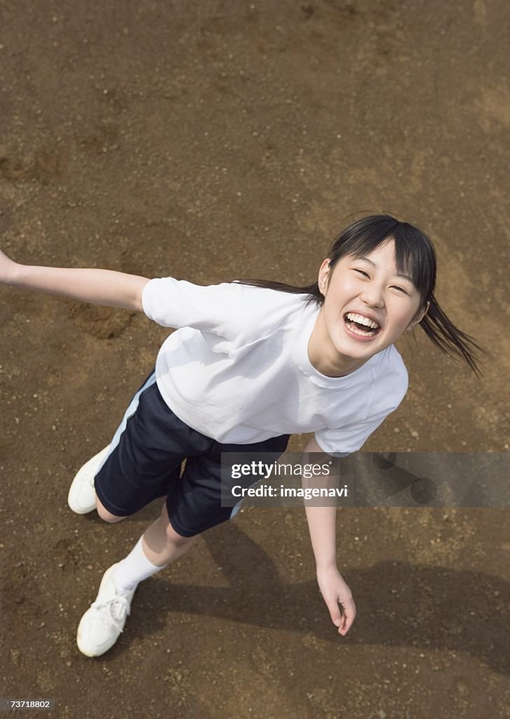 Teenagegirls in sports clothes smiling