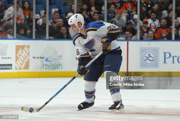 Matt Walker of the St. Louis Blues skates with the puck against the New York Islanders on March 1, 2007 at Nassau Coliseum in Uniondale, New York....