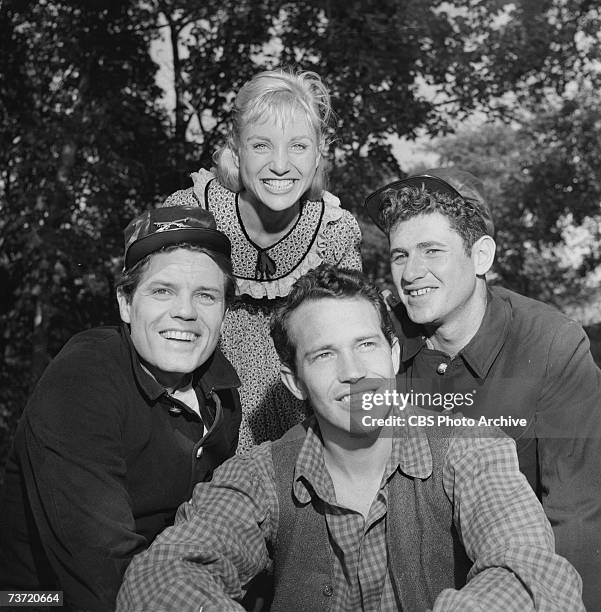 American film and television actors Jack Lord , Susan Oliver , Warren Oates , and Gerald Sarracini pose together for the episode 'A Day Before...
