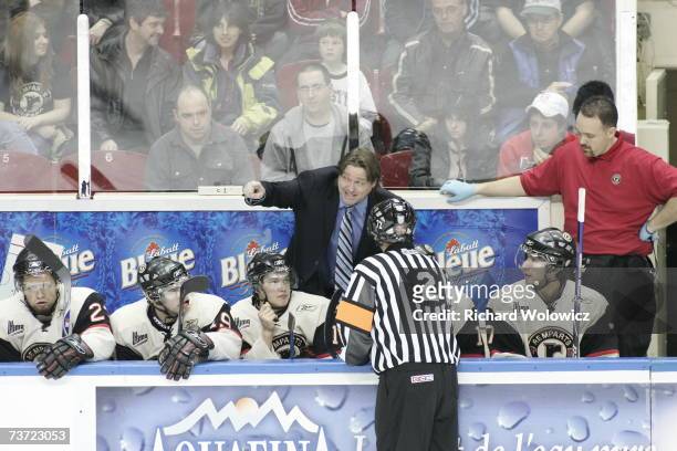Head coach Patrick Roy of the Quebec City Remparts discusses a call with an official during the game against the Drummondville Voltigeurs at Colisee...