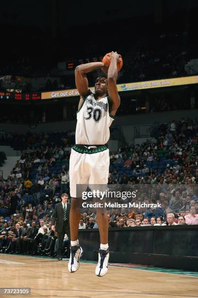 Mark Blount of the Minnesota Timberwolves shoots the outside jump shot against the Indiana Pacers during the game at the Target Center on March 13,...