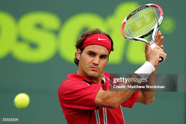 Roger Federer of Switzerland returns to Guillermo Canas of Argentina during day seven at the 2007 Sony Ericsson Open at the Tennis Center at Crandon...