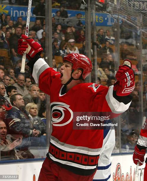 Eric Staal of the Carolina Hurricanes celebrates his goal against the Toronto Maple Leafs to the ice during their NHL game at the Air Canada Centre...
