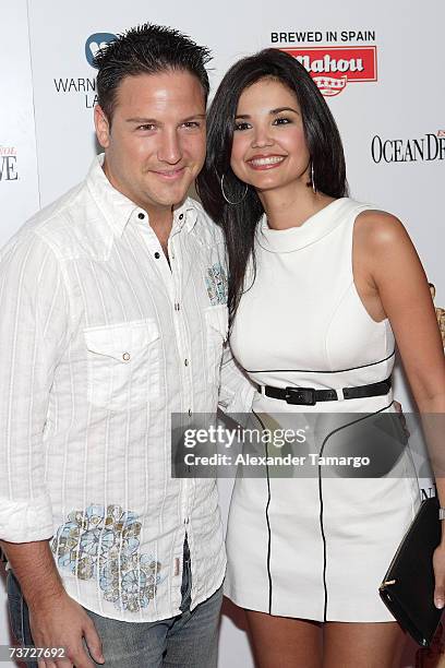 Paola Varela and guest pose on the red carpet during arrivals for Miguel Bose's "Papito" CD release party at Mokai on March 27, 2007 in Miami Beach,...