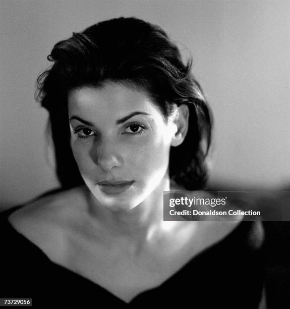 Actress Sandra Bullock poses for a photo shoot in 1993 at her residence in Los Angeles, California.