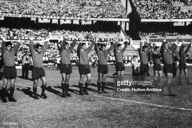 The Independiente football team greet the crowd at the River Plate Stadium in Buenos Aires, before beating Boca Juniors in the Copa Libertadores and...