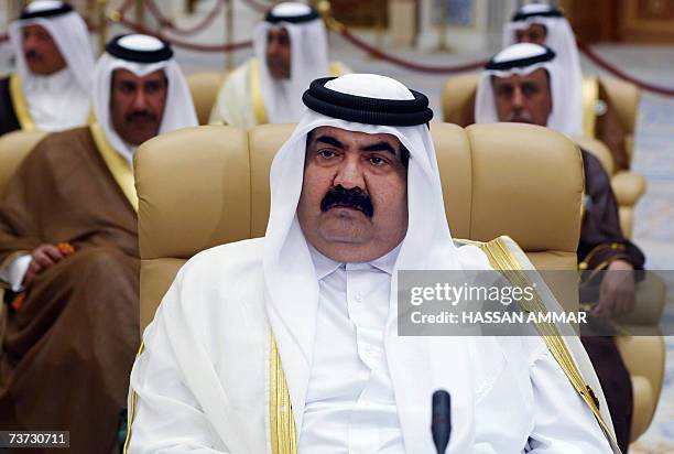 Qatar's Emir Sheikh Hamad bin Khalifa al-Thani and his delegation attend the opening session of a two-day summit in the Saudi capital Riyadh, 28...