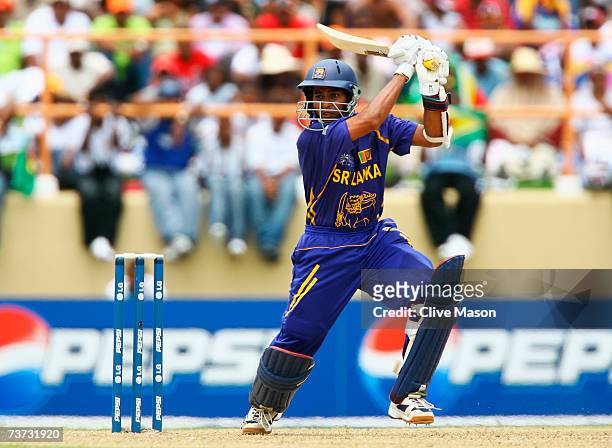 Tillakaratne Dilshan of Sri Lanka hits out during the ICC Cricket World Cup Super Eights match between South Africa and Sri Lanka at the Guyana...