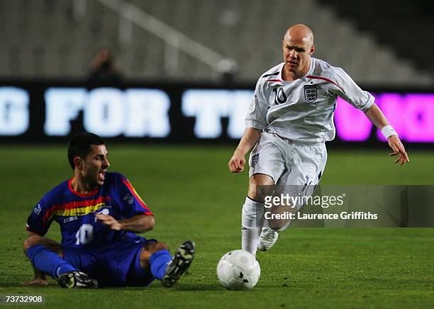 Andy Johnson of England battles with Marc Pujol of Andorra during the Euro 2008 Qualifying Match between Andorra and England at the Olympic Stadium...
