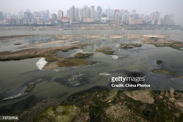 Polluted water on the Yangtze River is shown March 28, 2007 in Chongqing Municipality, China. China is to begin an all-out effort to protect its...