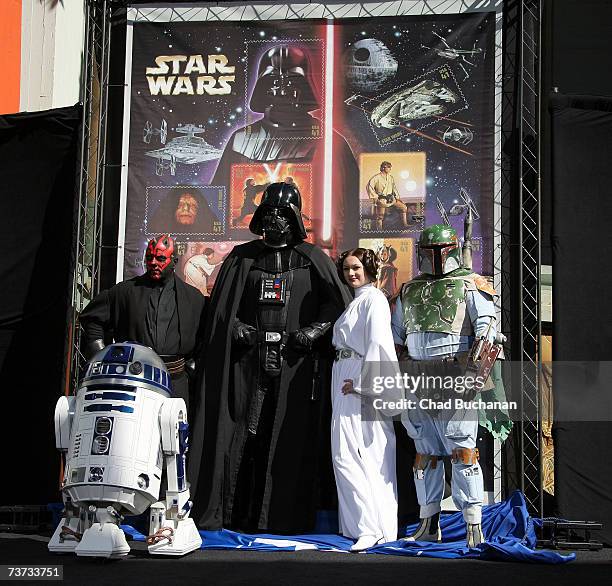 Star Wars characters Darth Maul, R2D2, Darth Vader, Princess Leia and Boba Fett help the United States Post Office celebrate the 30th anniversary of...