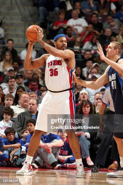 Rasheed Wallace of the Detroit Pistons is defended by Dirk Nowitzki of the Dallas Mavericks during the game at The Palace of Auburn Hills on March...