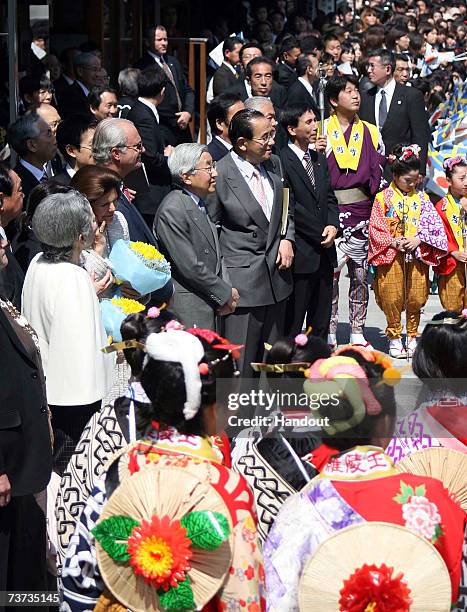 In this handout image released from Saitama Prefectural Office, Swedish King Carl XVI Gustaf, Queen Silvia , Japanese Emperor Akihito and Empress...