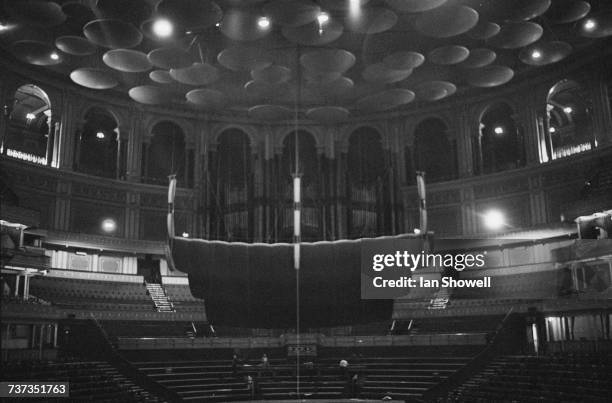 The interior of the Royal Albert Hall, South Kensington, London, after the replacement of the orchestral canopy with a new one almost twice as large...