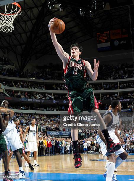 Ersan Ilyasova of the Milwaukee Bucks lays it up against the Dallas Mavericks on March 28, 2007 at the American Airlines Center in Dallas, Texas....