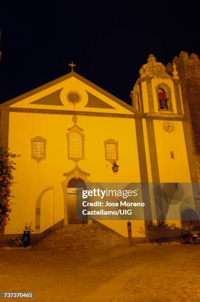 church of santiago at dusk, obidos, leiria district, estremadura, portugal - leiria district stock-fotos und bilder