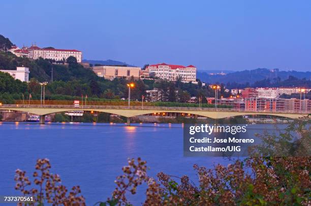 coimbra, old town and mondego river at dusk, beira litoral, portugal - mondego stock pictures, royalty-free photos & images